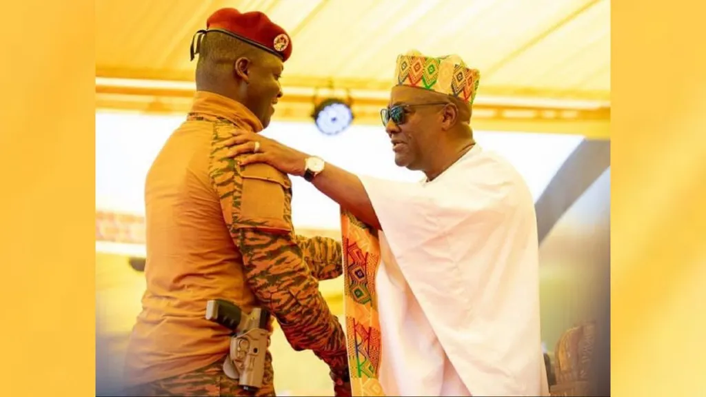 Gun-Wearing Burkina Faso Leader Sparks Concern At Ghana Inauguration gun wearing