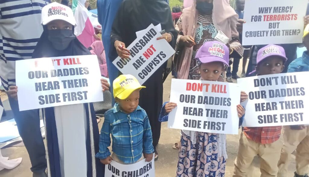 Coup families Protest e1775100479876